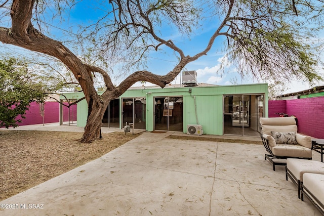 back of house featuring a patio area