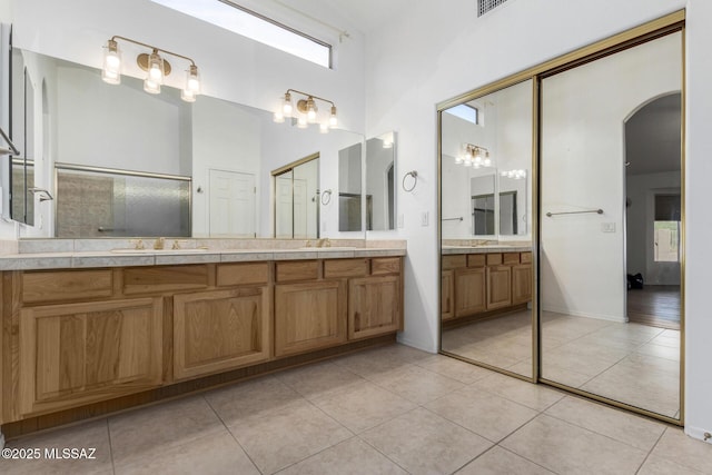 bathroom featuring tile patterned floors and vanity