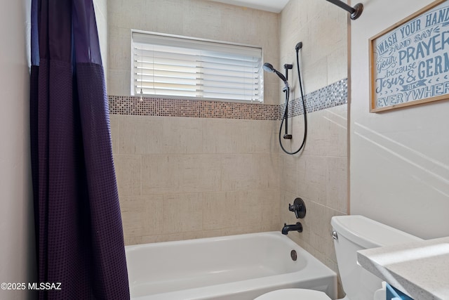 bathroom with shower / tub combo, vanity, and toilet