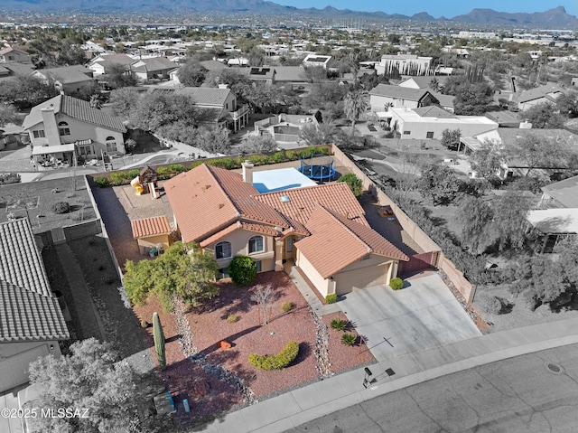 aerial view with a residential view and a mountain view