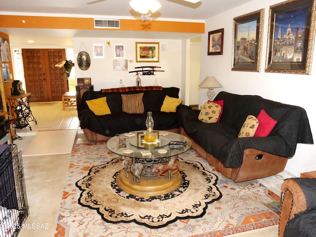 living room featuring a ceiling fan, visible vents, and recessed lighting