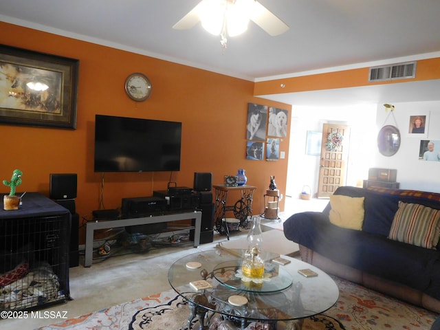 living area with visible vents, finished concrete floors, and ceiling fan
