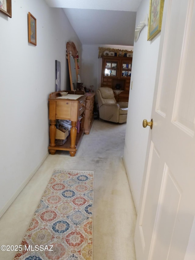 hallway with light carpet