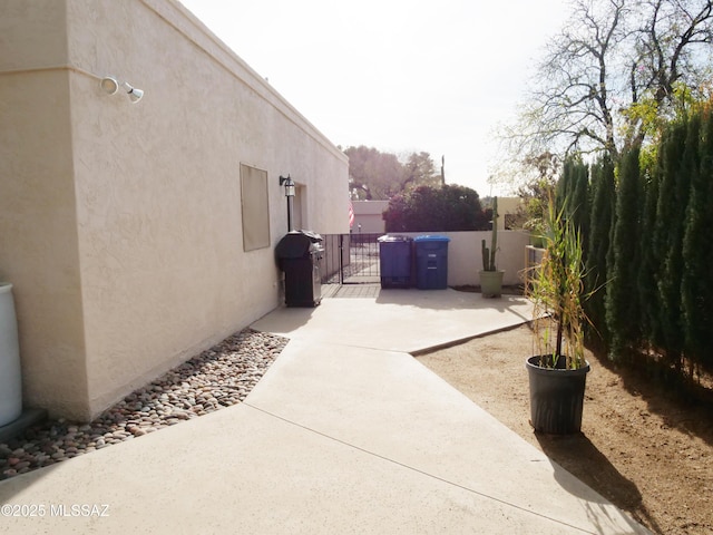 exterior space with fence and a gate