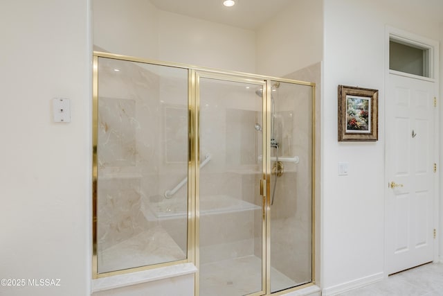 bathroom featuring a shower stall and recessed lighting