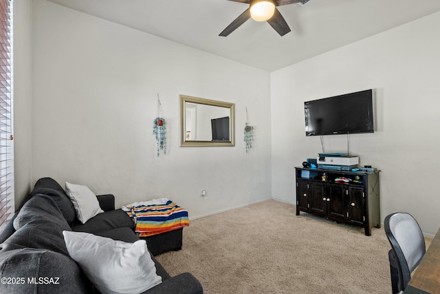 living room featuring carpet floors and a ceiling fan