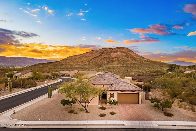 view of front of house featuring a mountain view