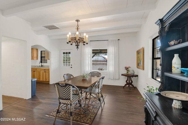 dining area featuring arched walkways, beam ceiling, dark wood-style flooring, and visible vents