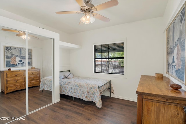 bedroom featuring ceiling fan, baseboards, and dark wood-style flooring