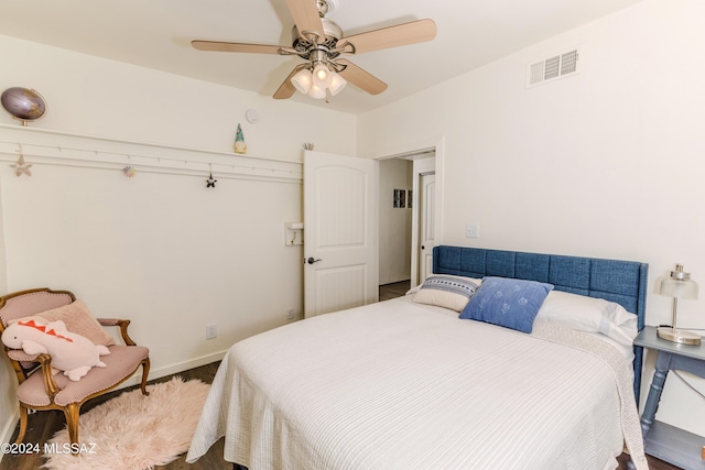 bedroom with visible vents and a ceiling fan