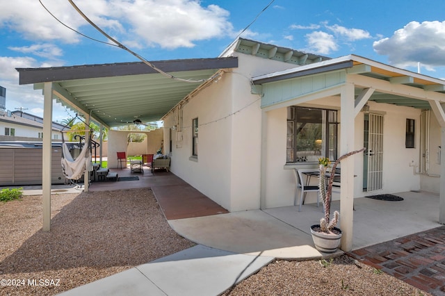 view of property exterior featuring a patio area and stucco siding