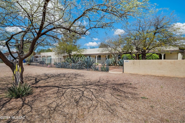 view of front facade with a fenced front yard