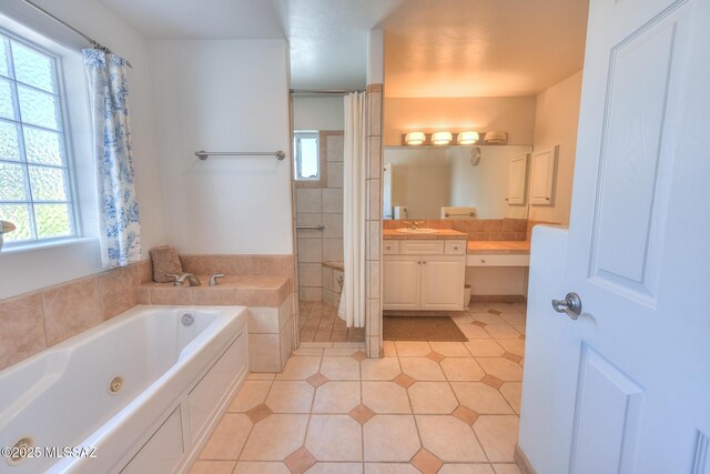 full bathroom featuring tile patterned flooring, vanity, a garden tub, and a shower with curtain