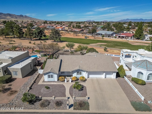 aerial view featuring a mountain view and a residential view