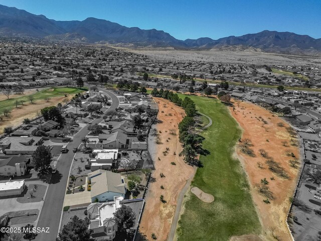 birds eye view of property with a mountain view and a residential view