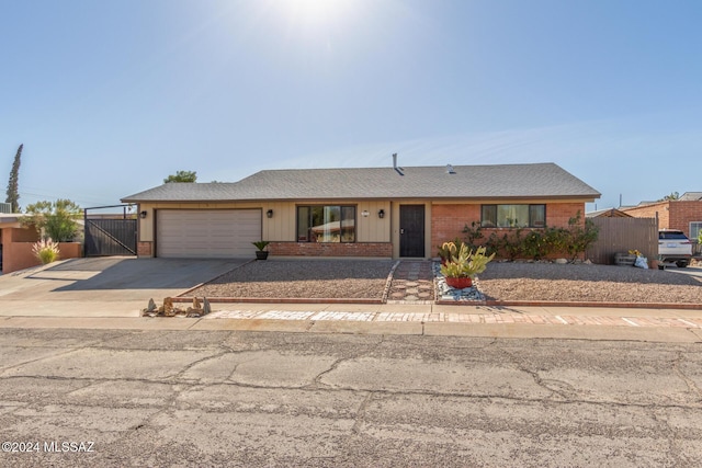 single story home with a garage