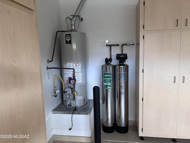 utility room with water heater