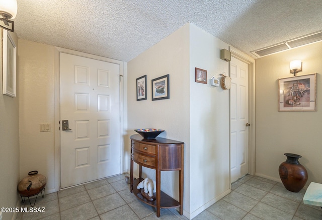 interior space featuring a textured ceiling