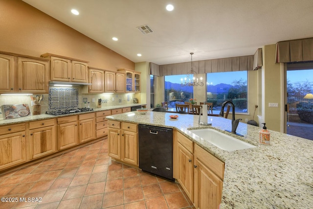 kitchen with gas stovetop, a sink, visible vents, dishwasher, and an inviting chandelier