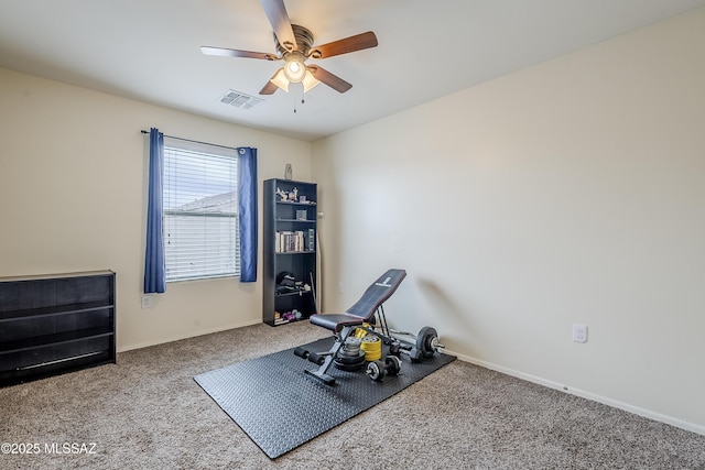 exercise room with carpet floors and ceiling fan