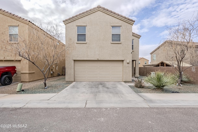 view of front of home with a garage