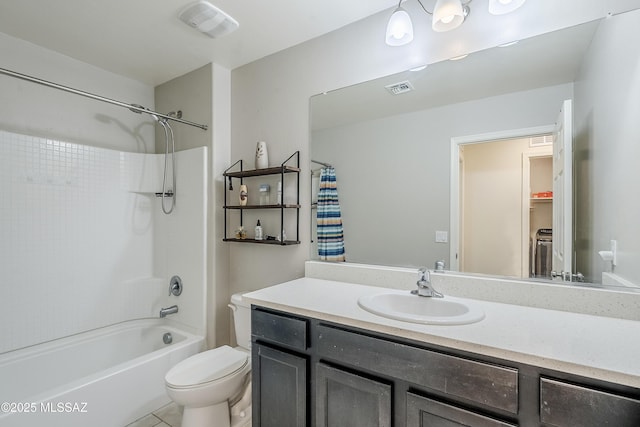 full bathroom featuring toilet, vanity, and bathtub / shower combination