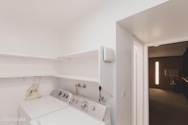 laundry room featuring laundry area and washer and clothes dryer