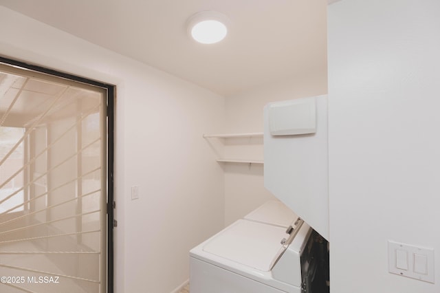 washroom featuring laundry area and separate washer and dryer