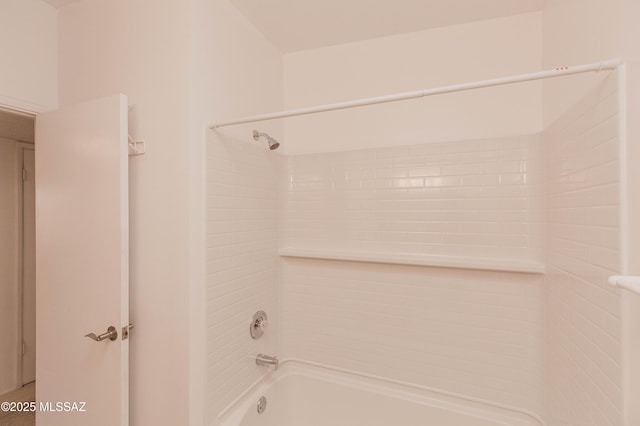 bathroom featuring washtub / shower combination