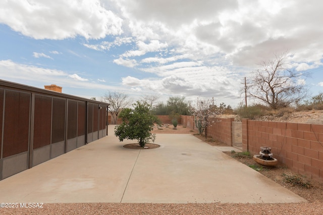 exterior space featuring a fenced backyard