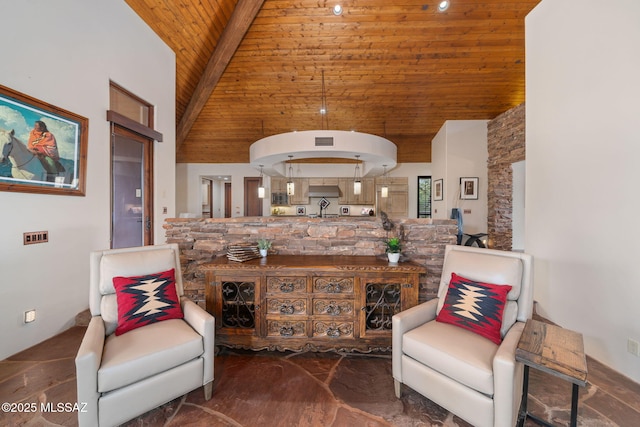 sitting room featuring high vaulted ceiling, wood ceiling, and beam ceiling