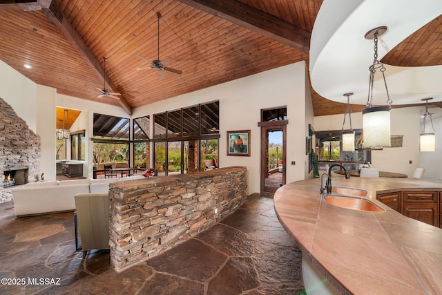 view of patio with sink and ceiling fan