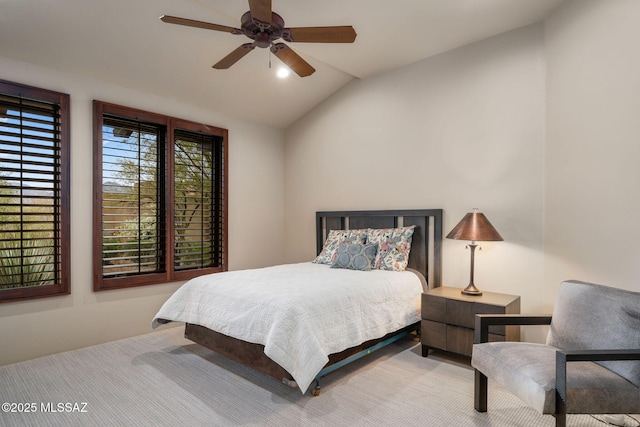 bedroom with vaulted ceiling and ceiling fan