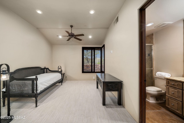 carpeted bedroom with lofted ceiling and ceiling fan