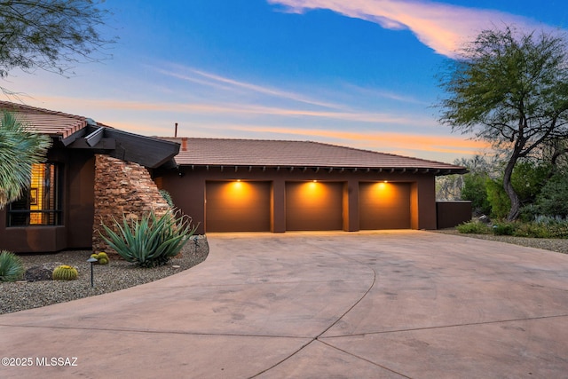 view of front of home with a garage