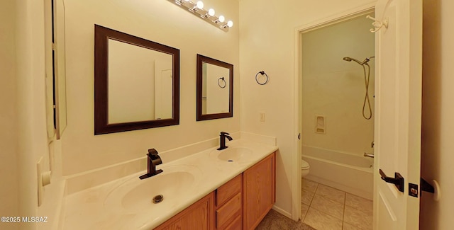 full bathroom featuring  shower combination, toilet, tile patterned flooring, and vanity