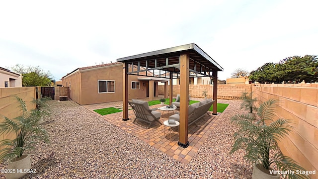 view of yard with outdoor lounge area and a patio