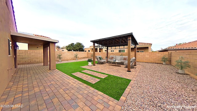 view of yard featuring an outdoor living space and a patio