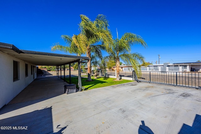 view of patio / terrace with a carport