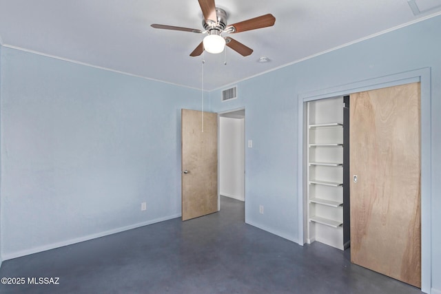 unfurnished bedroom with concrete floors, a closet, crown molding, a ceiling fan, and baseboards