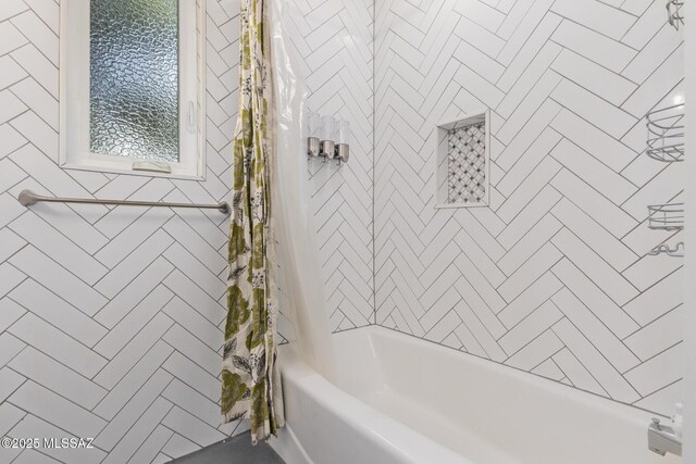 full bathroom with shower / tub combo with curtain