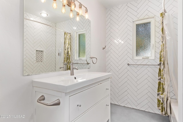 bathroom with vanity and a shower with curtain