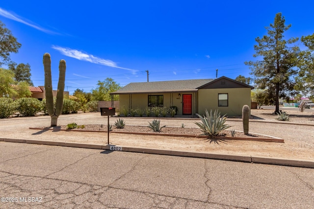 view of front of home featuring stucco siding