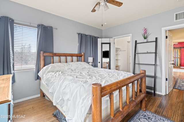 bedroom featuring ceiling fan and wood-type flooring