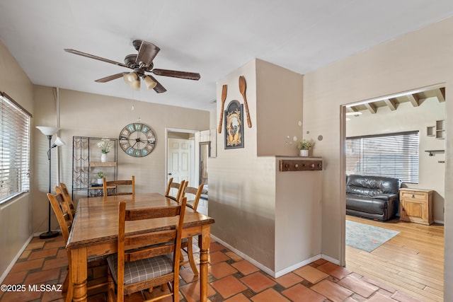 dining room with ceiling fan