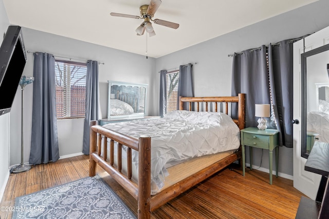 bedroom featuring ceiling fan and hardwood / wood-style floors