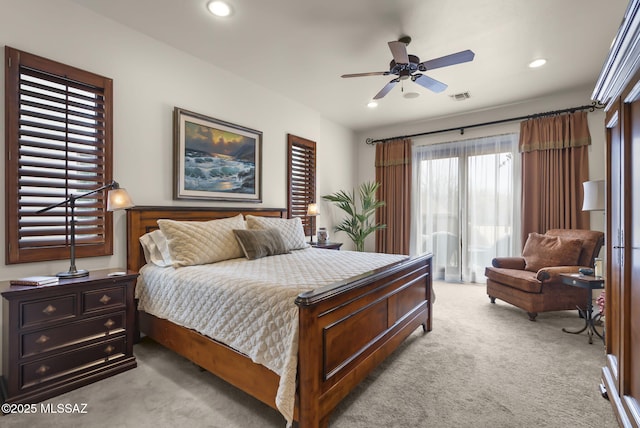 bedroom with light colored carpet