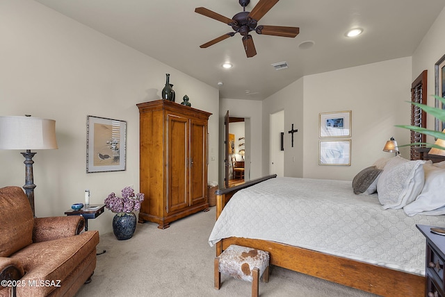 bedroom featuring light carpet and ceiling fan