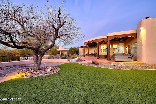 12342 E Barry Baker Pl, Tucson, AZ 85749 - view of yard featuring a hot tub, a patio, and fence