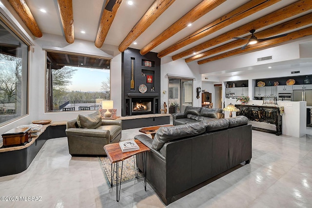 12342 E Barry Baker Pl, Tucson, AZ 85749 - living area with visible vents, recessed lighting, a fireplace, and beamed ceiling